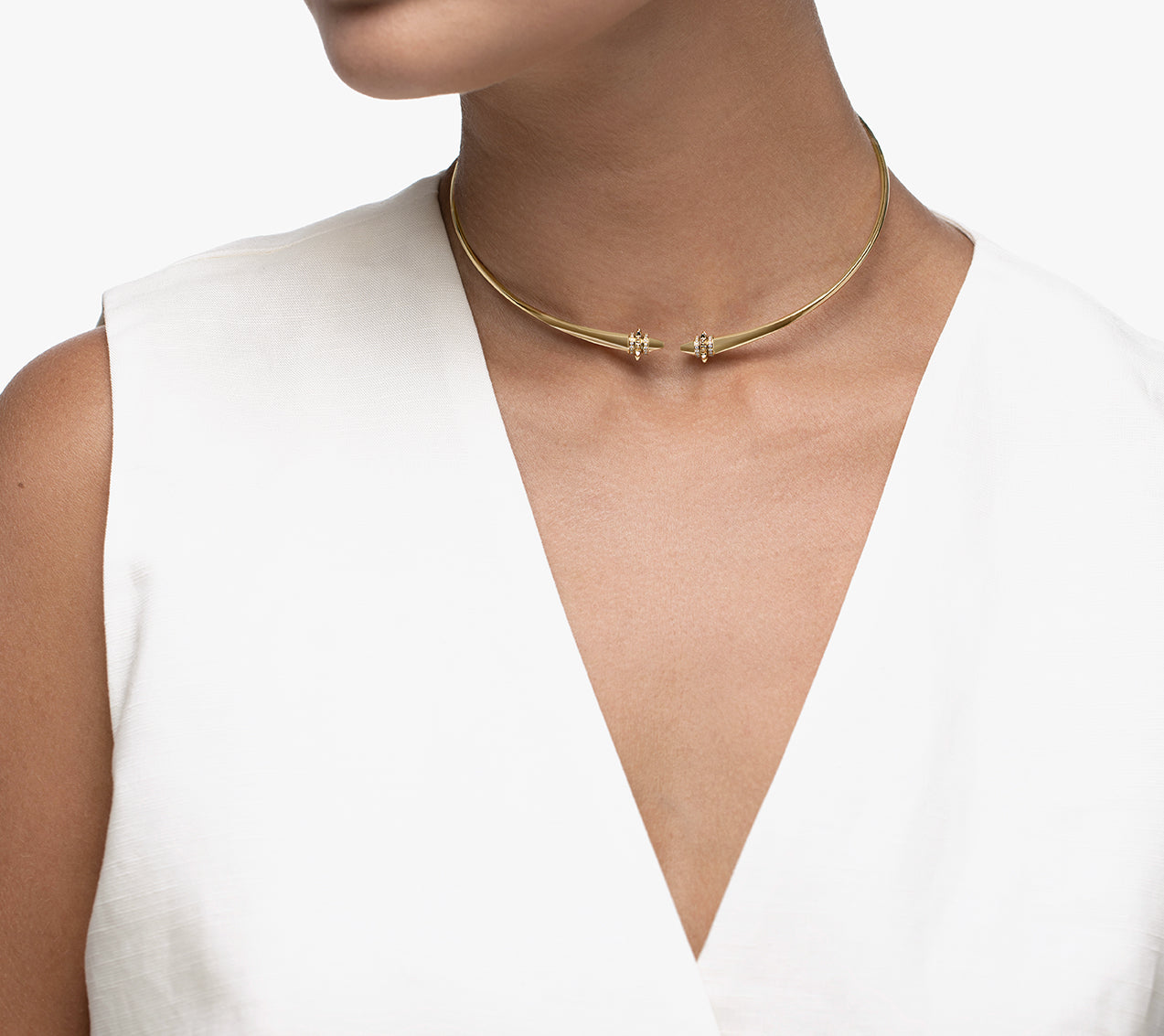 Hab El Hayl gold choker with origins element on a white background