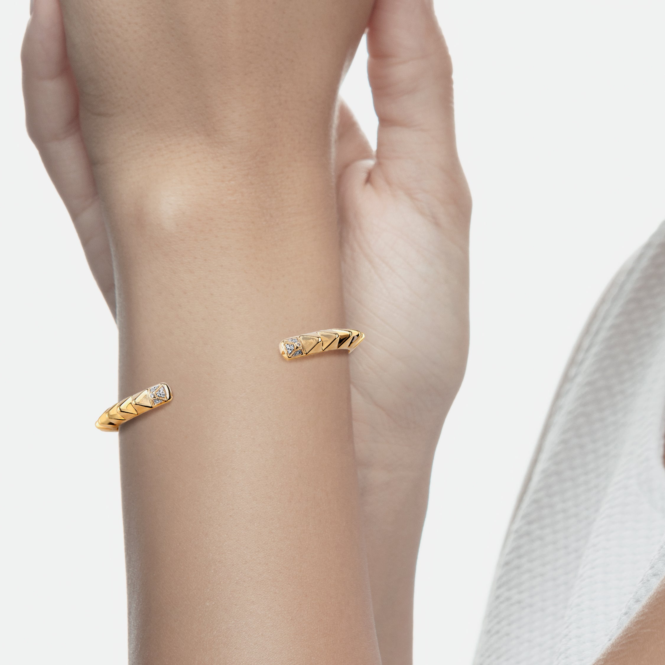 Hab El Hayl 2nd Edition Bangle in Yellow Gold with Diamonds on tip and middle side - Al Zain Jewellery
