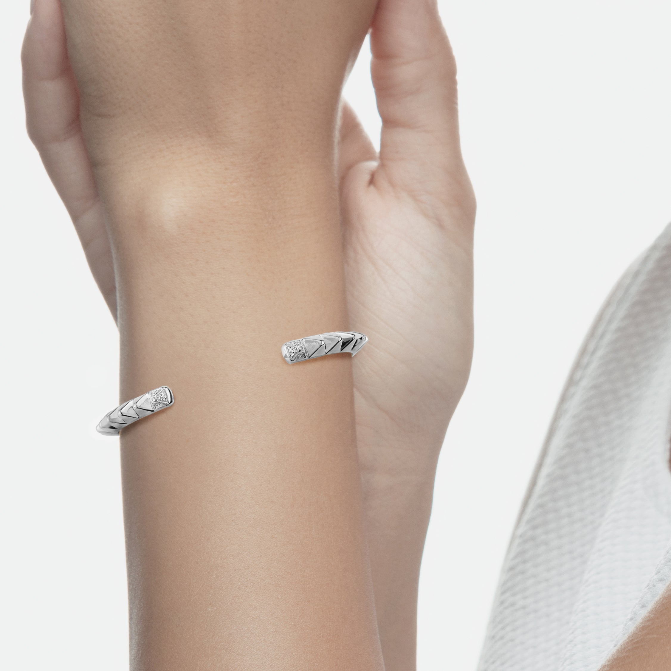Hab El Hayl 2nd Edition Bangle in White Gold with Diamonds on tip and middle side - Al Zain Jewellery