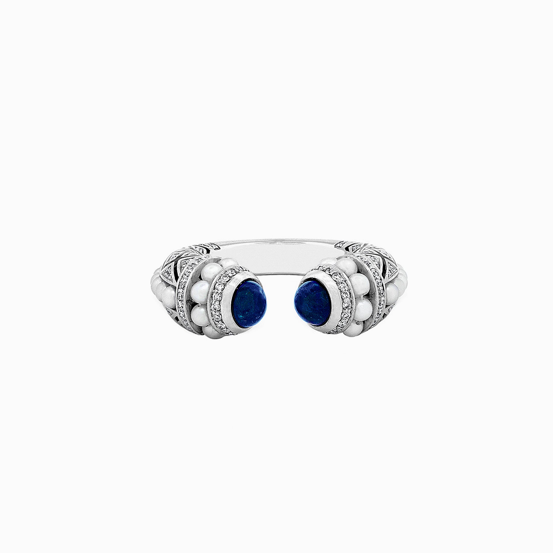 Mushaabak white gold ring with blue sapphire gemstones set with diamonds and natural Bahraini pearls on a white background