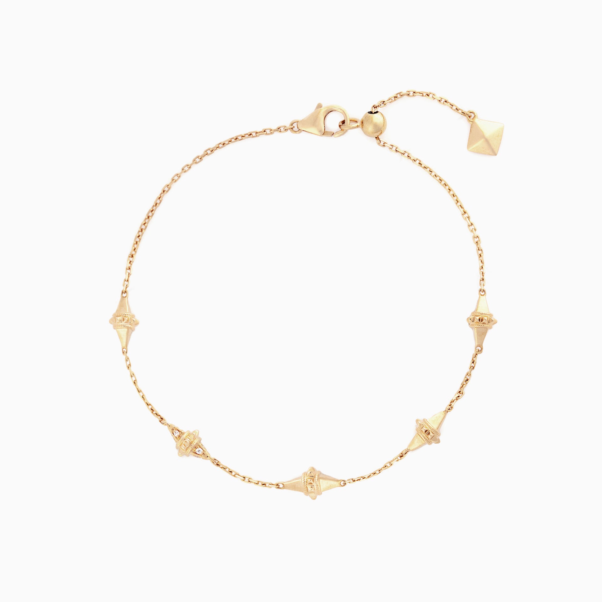Hab El Hayl gold bracelet with geometric designs on a white background