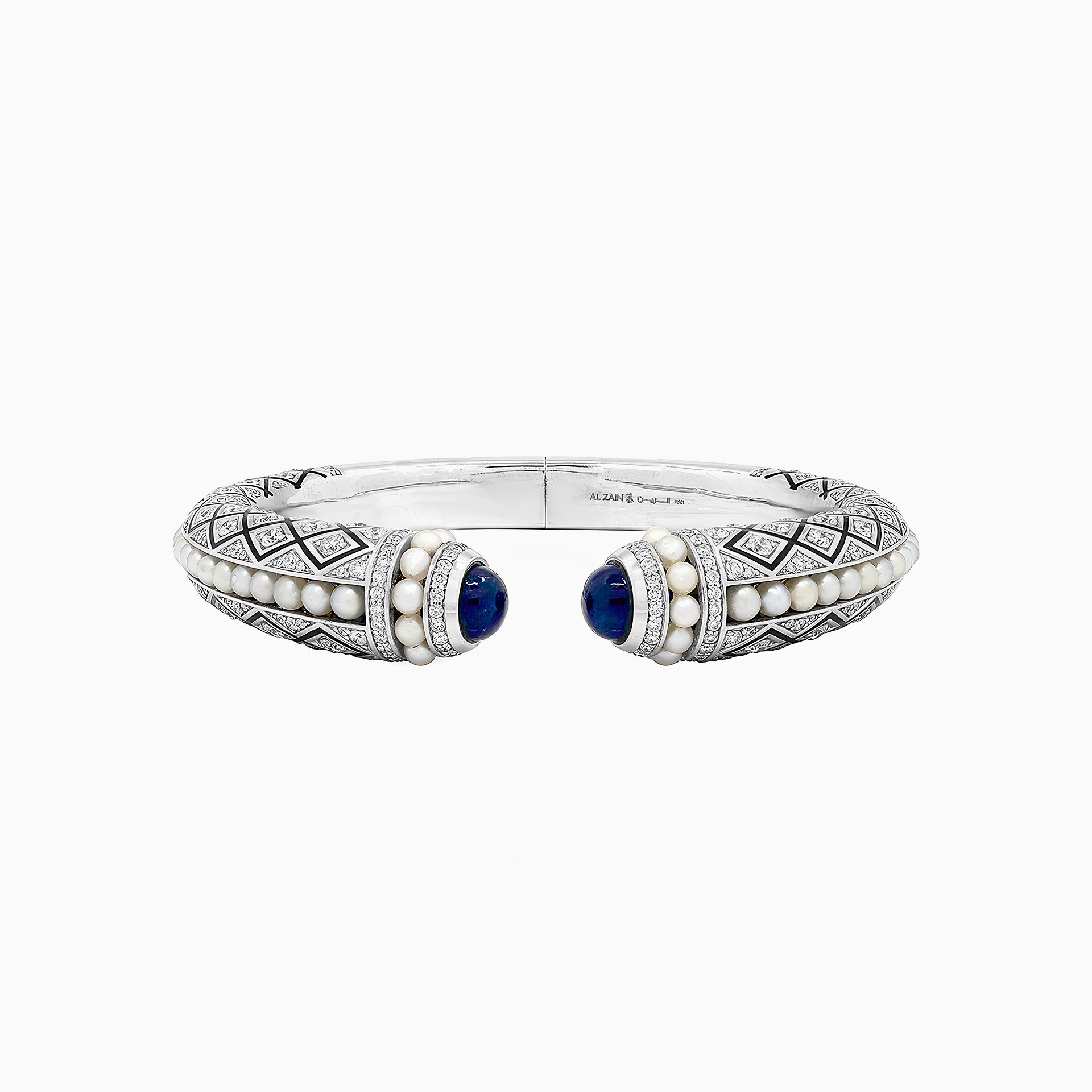 Al Zain Mushaabak 18k white gold clasp bracelet with blue sapphire gemstones set with diamonds and natural Bahraini pearls on a white background