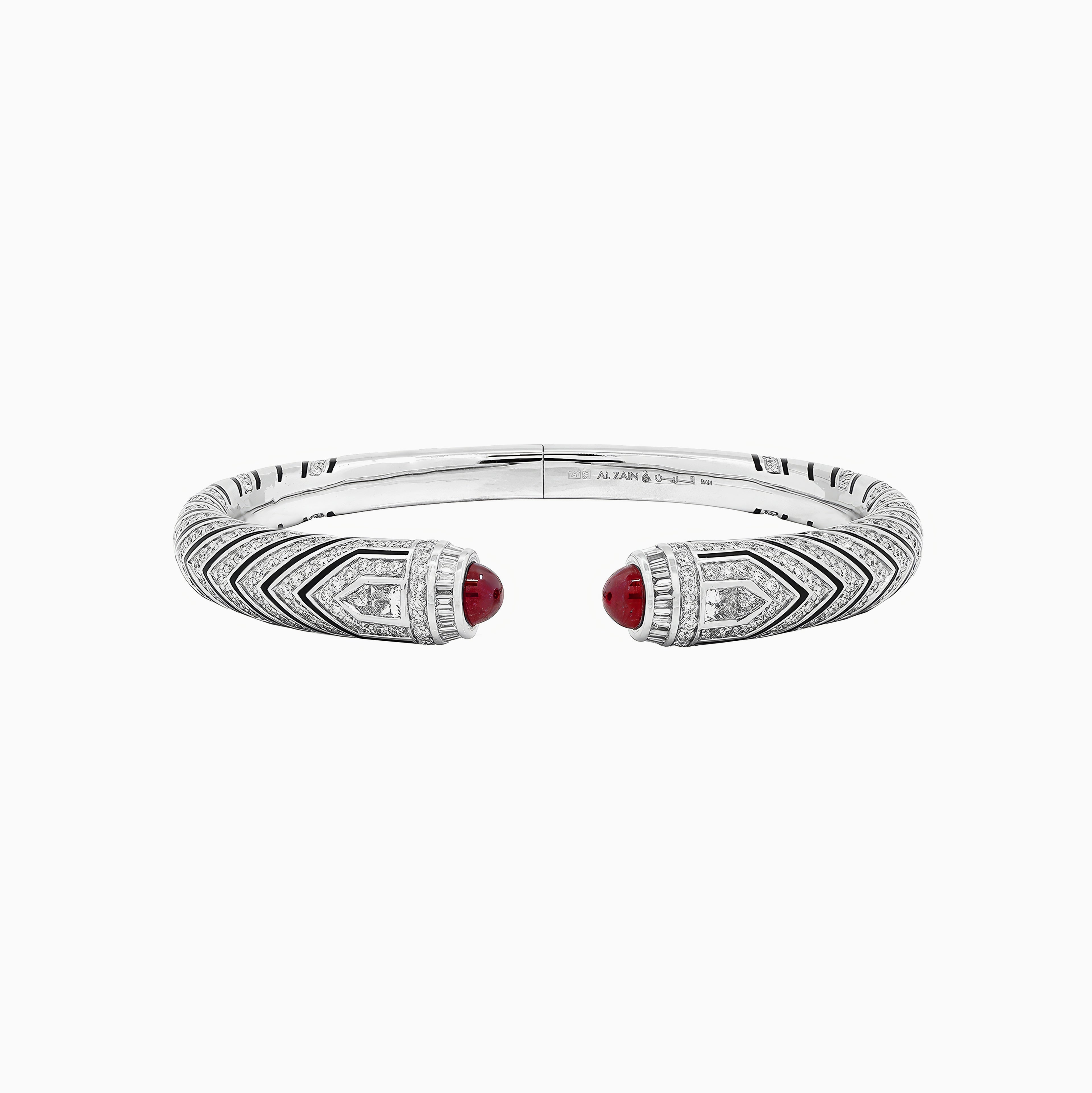 Al Zain Mushaabak white gold clasp bangle with red ruby gemstones set with diamonds on a white background