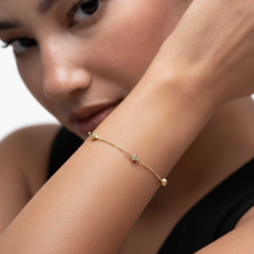 Woman in black wearing hab el hayl bracelet 18k yellow gold with diamonds in white background