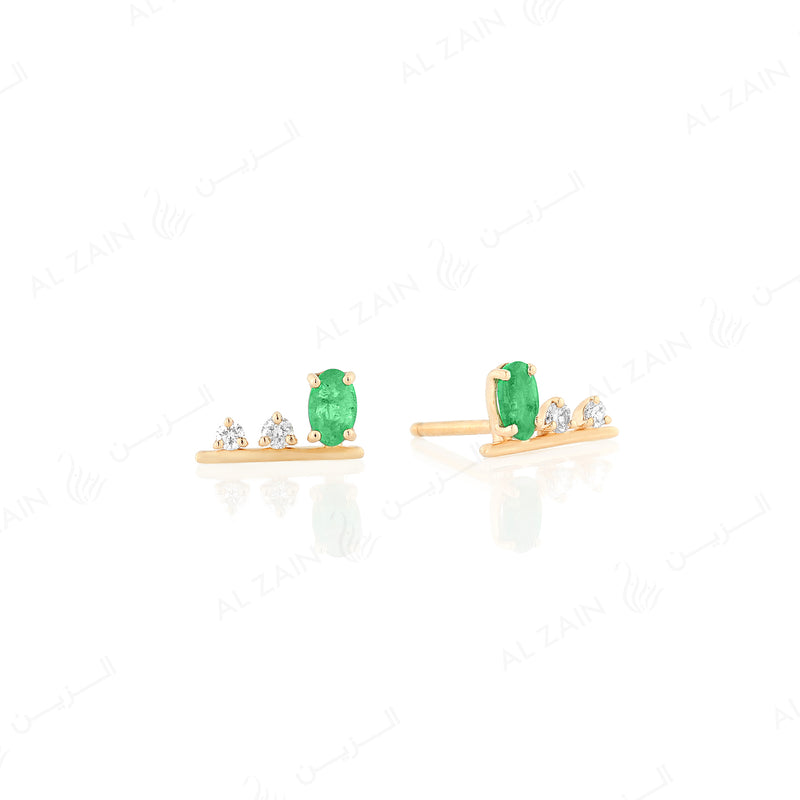 Mystique earrings in yellow gold with diamonds and emerald stone