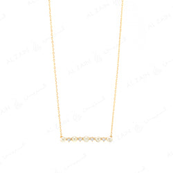Mystique necklace with pearl and  diamonds in yellow gold