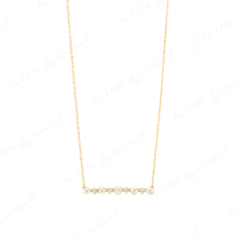 Mystique necklace with pearl and  diamonds in yellow gold