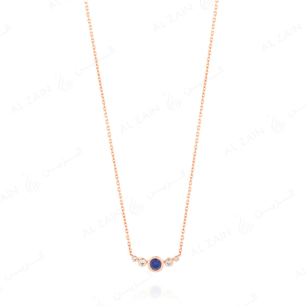 Mystique necklace in rose gold with diamonds and sapphire stone