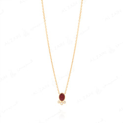 Mystique necklace in yellow gold with diamonds and ruby stone