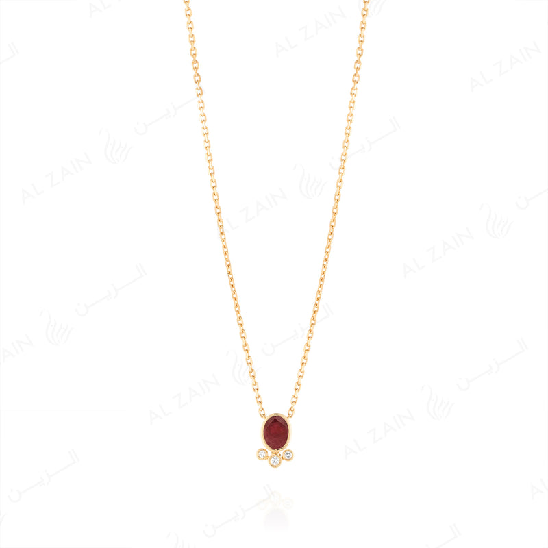 Mystique necklace in yellow gold with diamonds and ruby stone