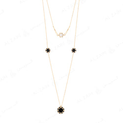 Cordoba necklace in yellow gold with onyx and mother of pearl stones