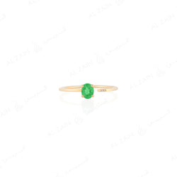 Mystique ring in yellow gold with diamonds and emerald stone