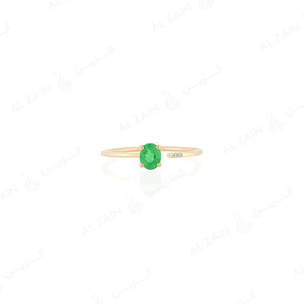 Mystique ring in yellow gold with diamonds and emerald stone