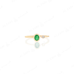 Mystique ring in yellow gold with diamonds and emerald stone