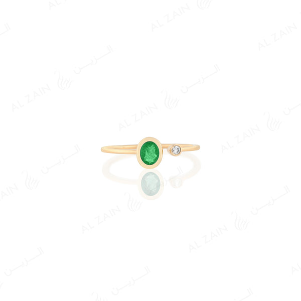 Mystique ring in yellow gold with diamonds and emerald stone