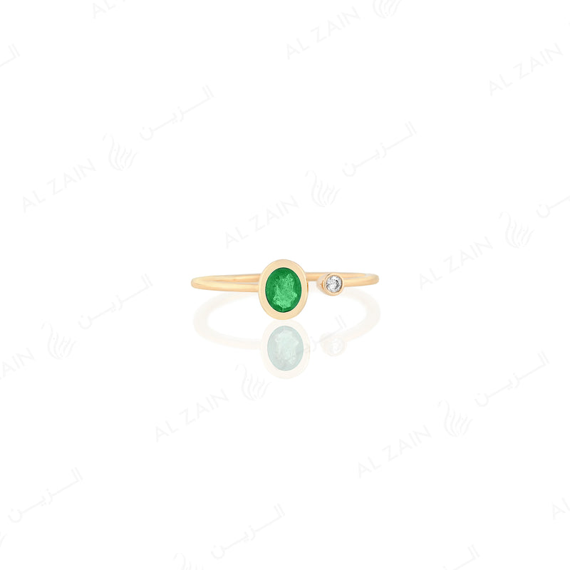 Mystique ring in yellow gold with diamonds and emerald stone